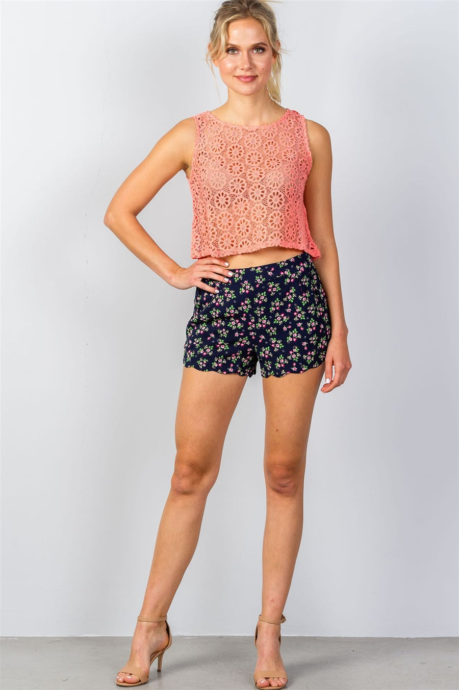 Ladies fashion navy floral print scalloped hem shorts